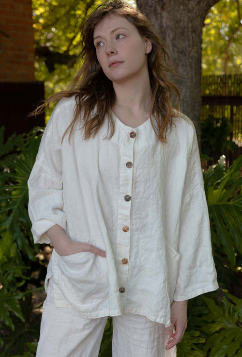 White linen blouse with buttons